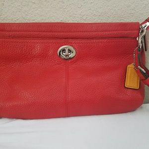 Coach turnlock clutch Dark Coral/Orange